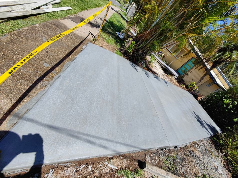 Ghan Concrete Construction — modern home with new concrete driveway
